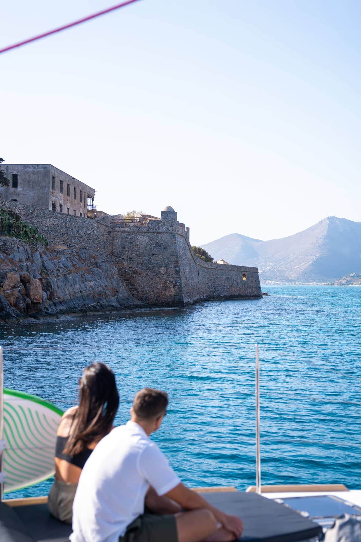 The Venetian walls of Spinalonga from the water, on the crossing from Plaka