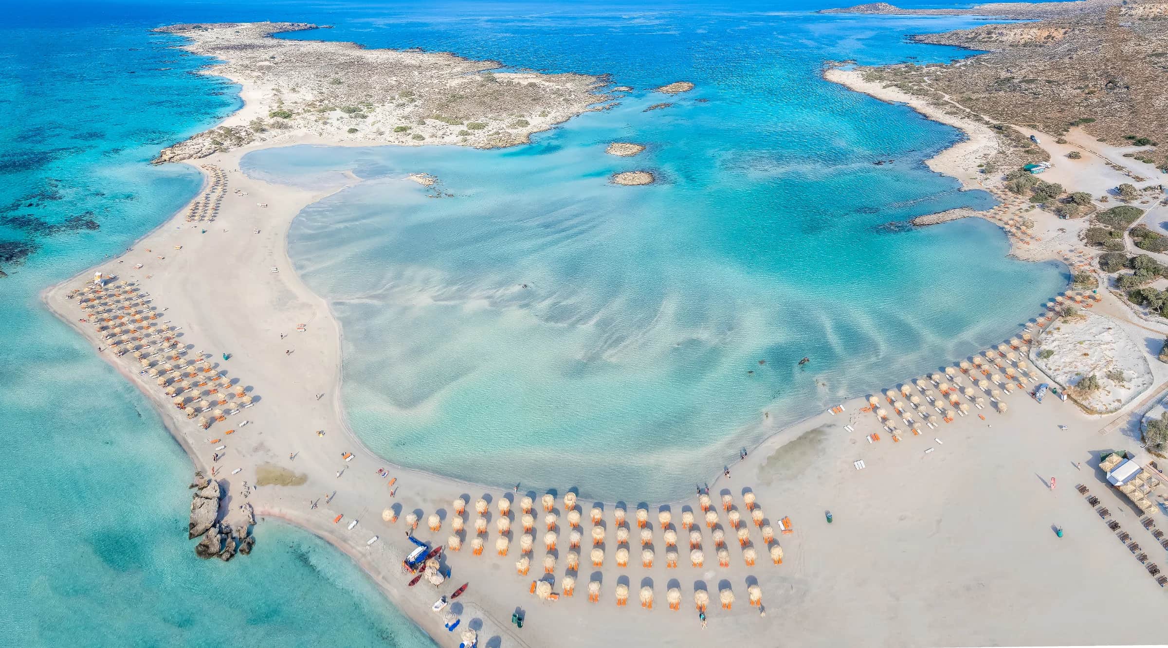 The pink-tinted sand and shallows at Elafonisi, southwest Chania